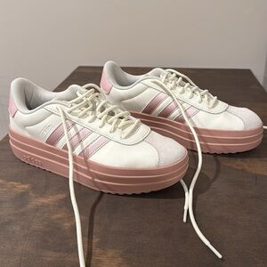 Size 8.5 Women’s Adidas fashion sneakers. Excellent condition- only worn once.